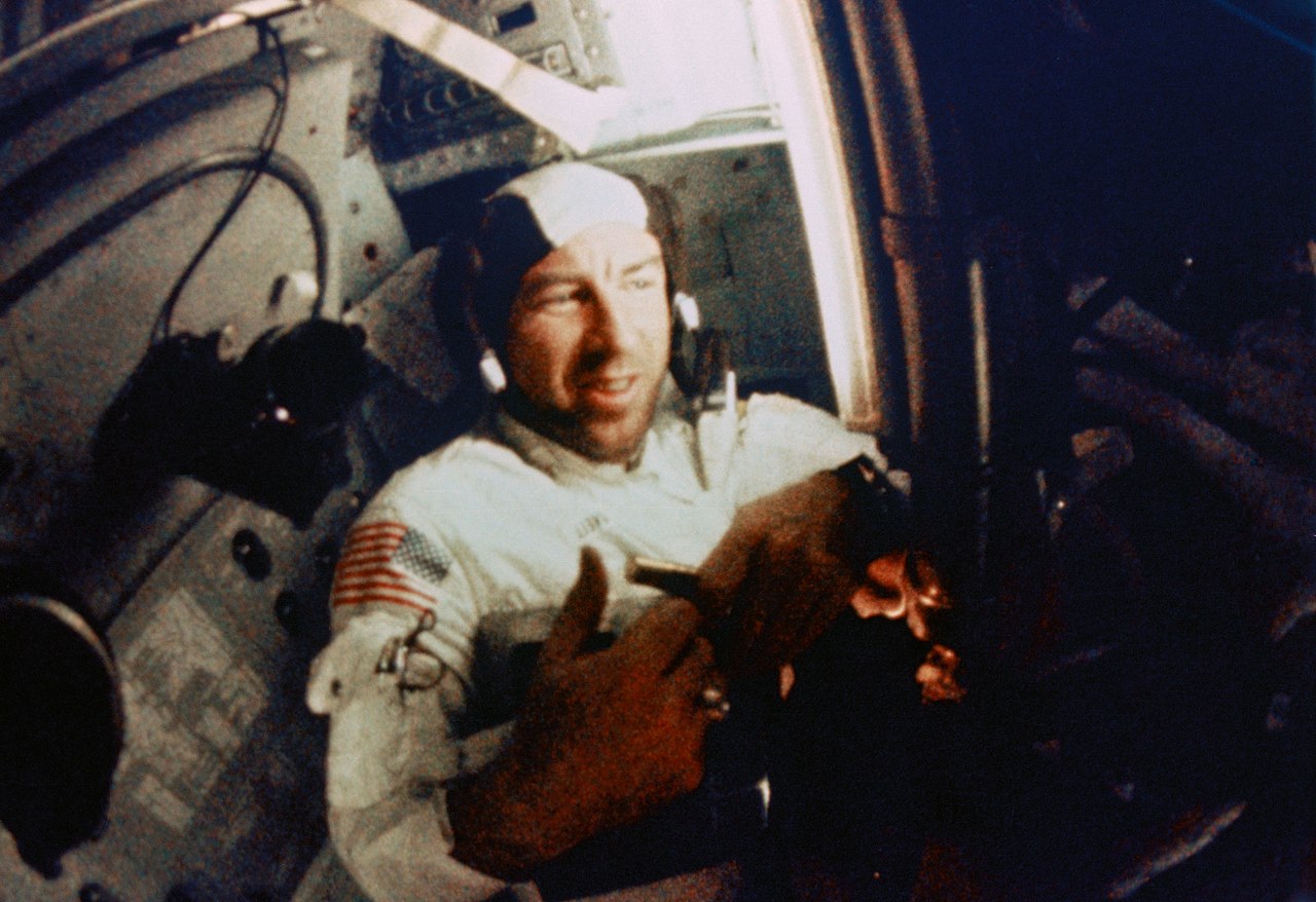 S68-56533 (21-27 Dec. 1968) --- Astronaut James A. Lovell Jr., command module pilot, is shown during intravehicular activity (IVA) on the Apollo 8 lunar orbit mission. This still print was made from m