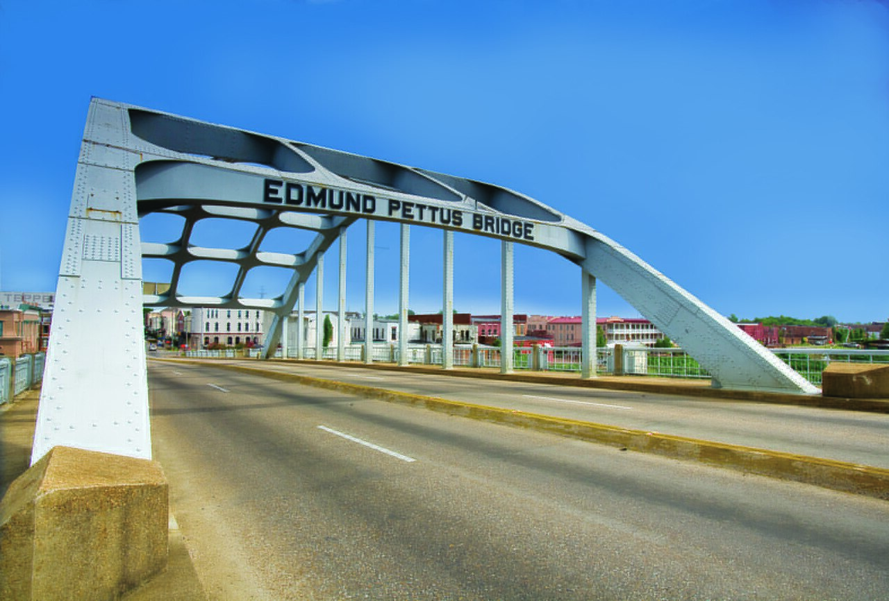 Scope and content:  The original finding aid described this photograph as:
Original Caption: The name of the Edmund Pettus Bridge highlights a steel beam across a four lane highway.
Location: Selma, A