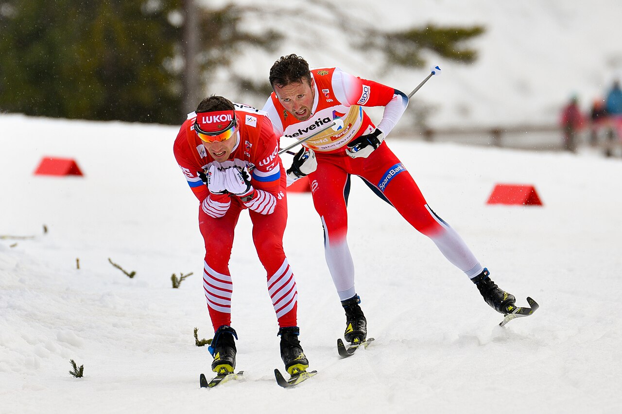 FIS Nordic World Ski Championships Seefeld 2019 - Men 4x10km Relay Classic/Free. Picture shows Andrey Larkov (RUS), Emil Iversen (NOR).