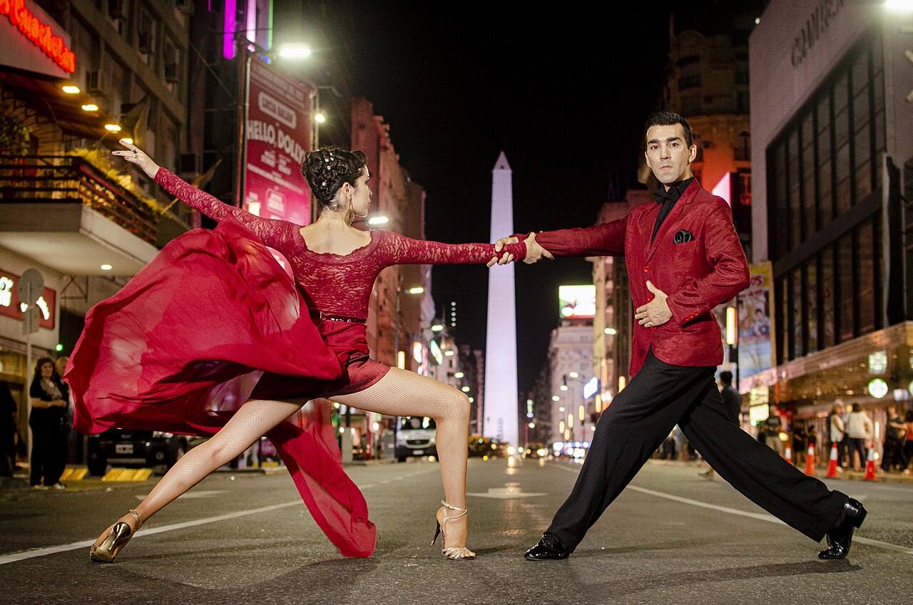 The grace and strength of tango, in the mythical Corrientes street of Buenos Aires. The dancers are Sabrina Ramos Carrasco (left) and Horacio Herrera (right), who can be contacted on their Facebook, I