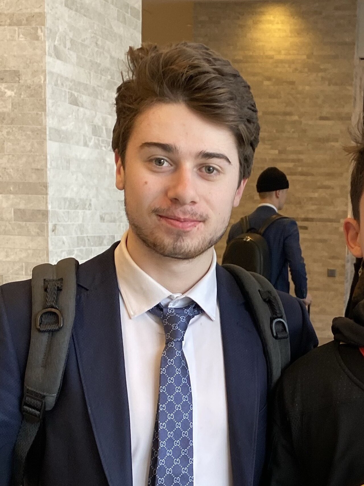 Quinn Hughes and a fan