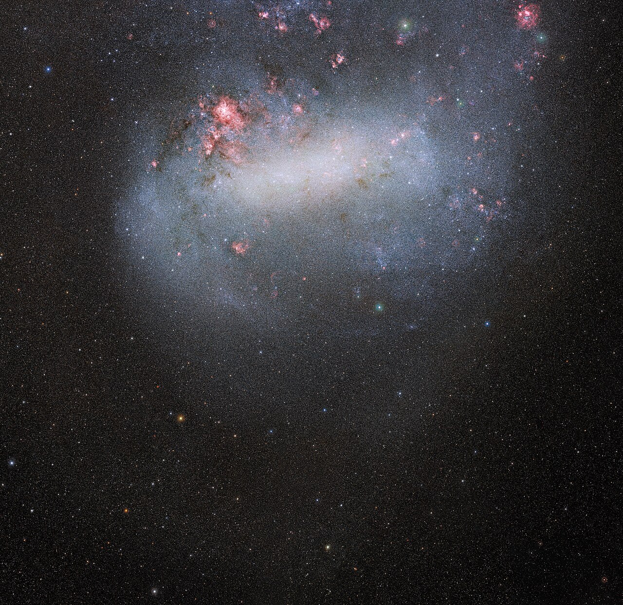 Part of the SMASH dataset showing an unprecedented wide-angle view of the Large Magellanic Cloud. The Large and Small Magellanic Clouds are the largest satellite galaxies of the Milky Way and, unlike 