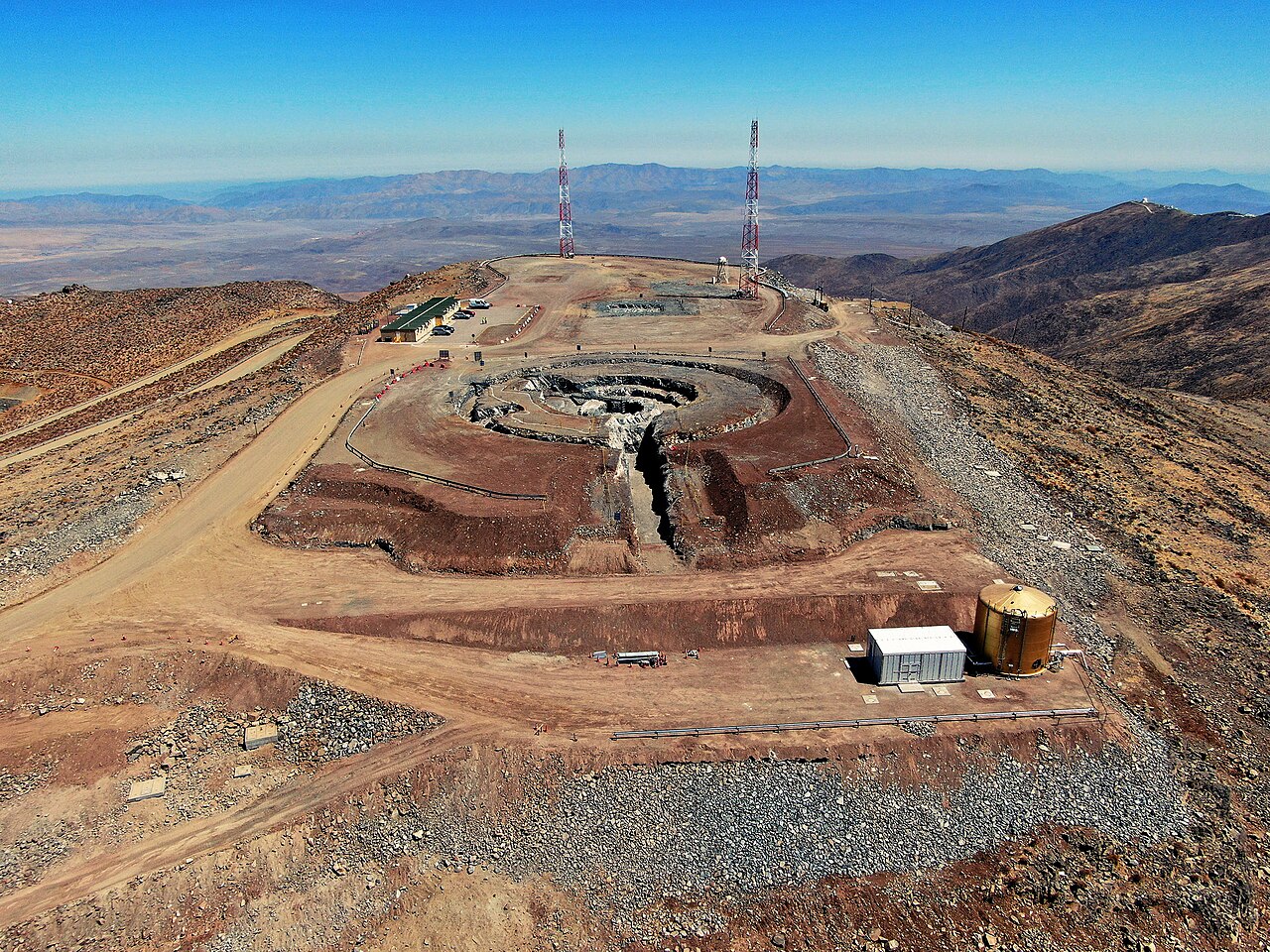 February 26, 2020: Daytime aerial view of Giant Magellan Telescope construction site on the summit at Las Campanas Peak in Chile's Atacama Desert. Credit: Francisco Figueroa, Giant Magellan Telescope 