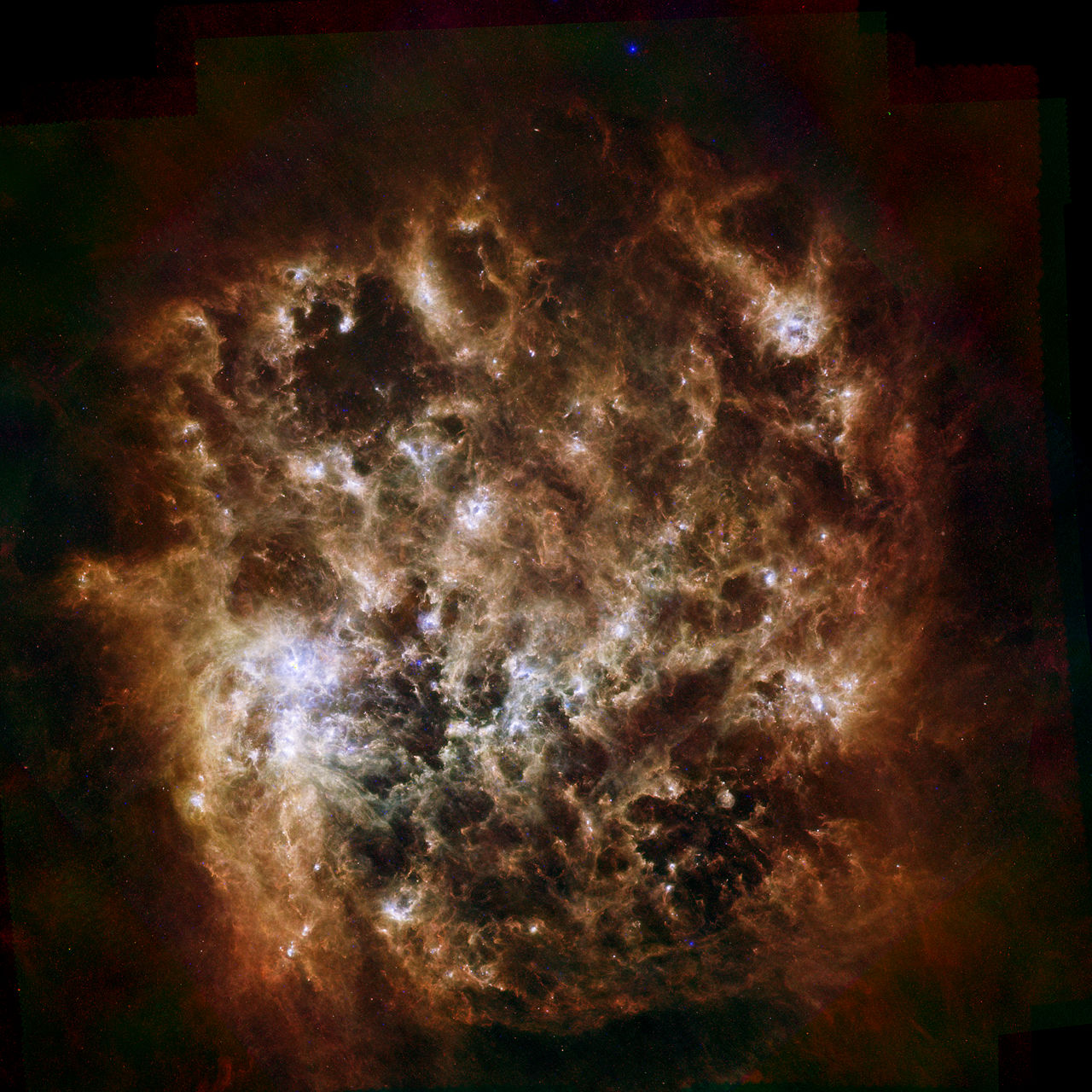 This image shows the Large Magellanic Cloud galaxy in infrared light as seen by the Herschel Space Observatory, a European Space Agency-led mission with important NASA contributions, and NASA's Spitze
