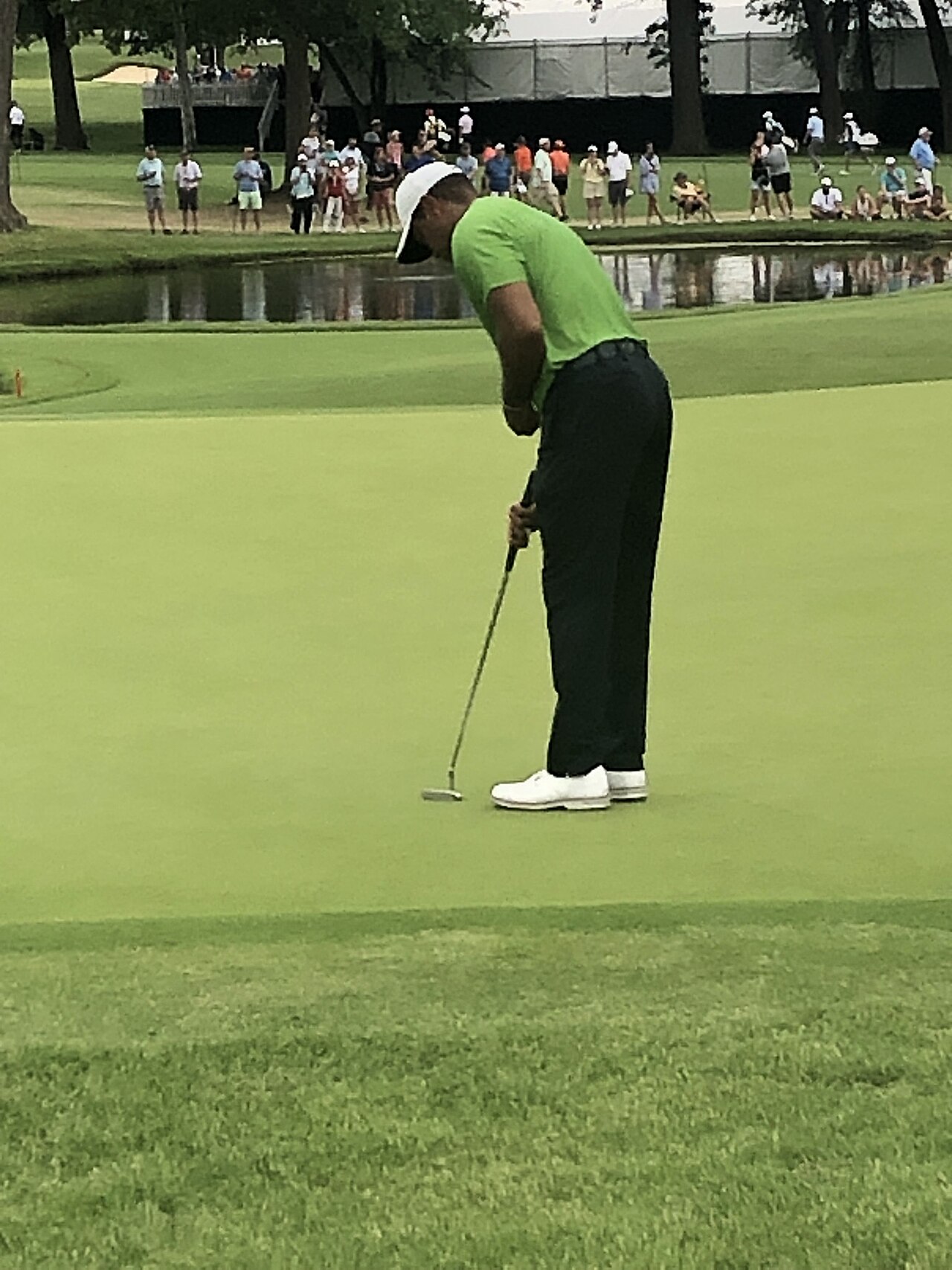 Tiger Woods golfing in the 2022 PGA Championship at Southern Hills Golf Course